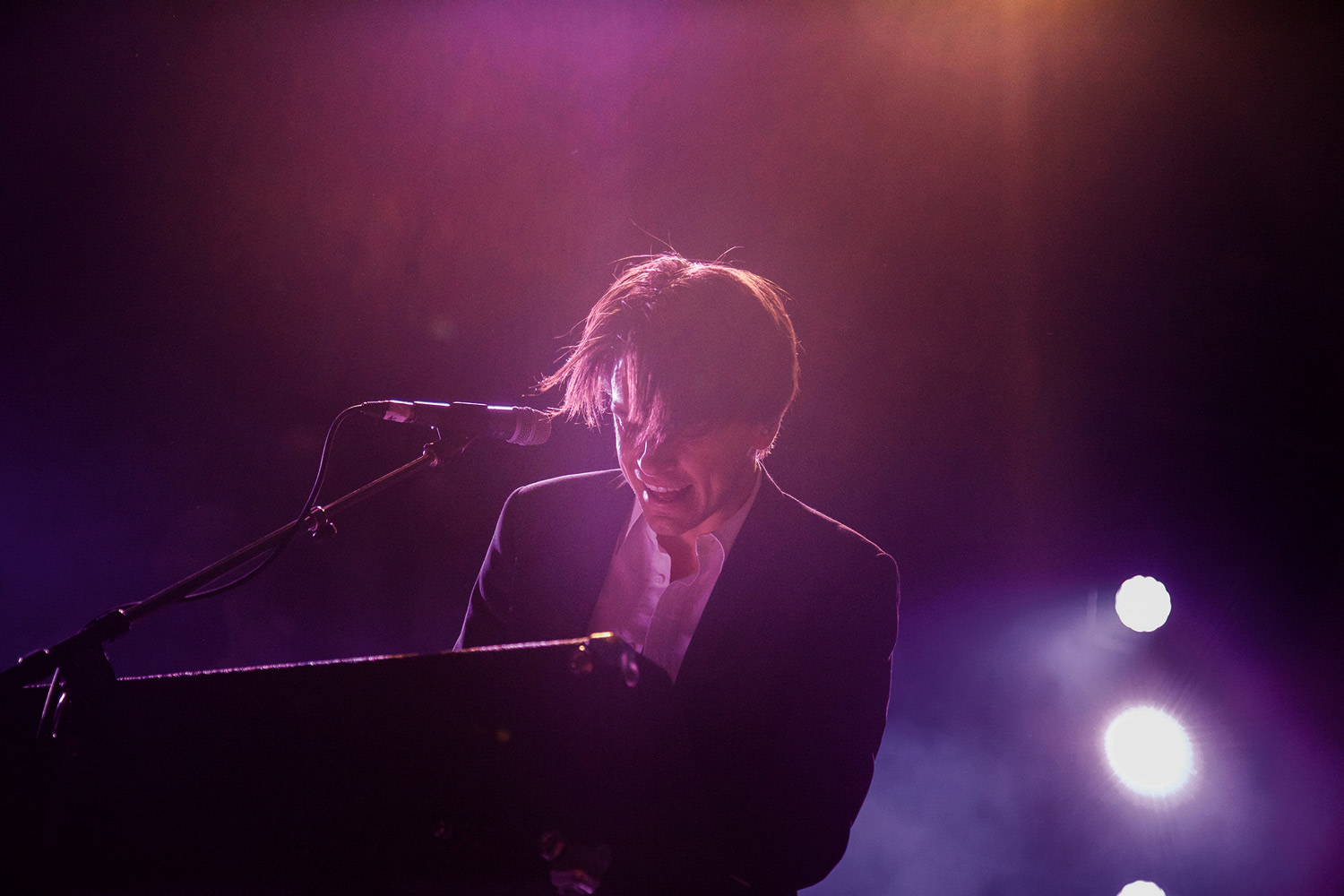 Playing the keyboard at Rifflandia concert